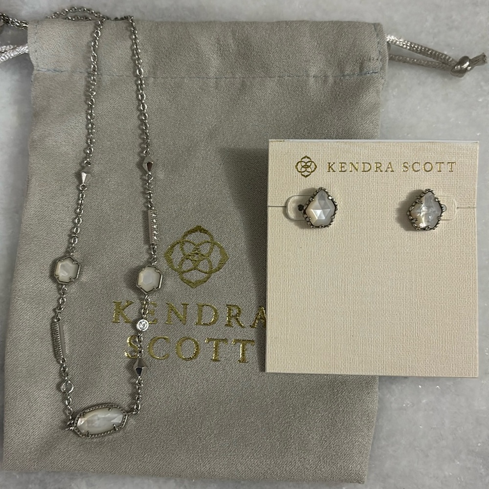 Kendra Scott Elisa necklace and Tessa earrings in ivory mother of pearl